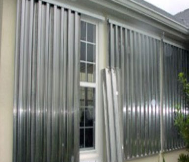 We properly install hurricane shutters