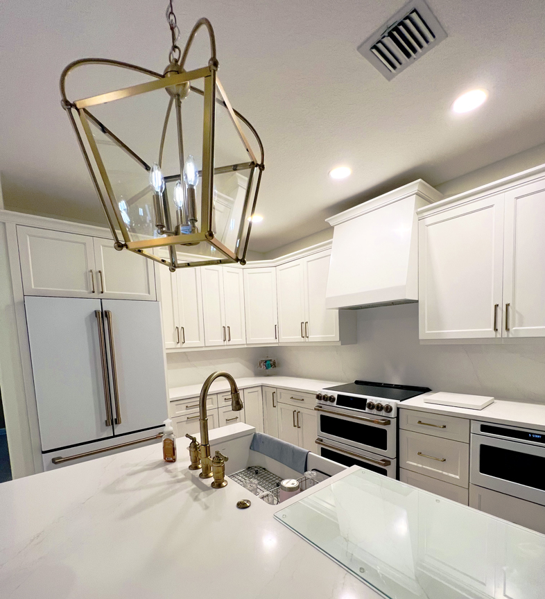 Real marble accent wall in kitchen.